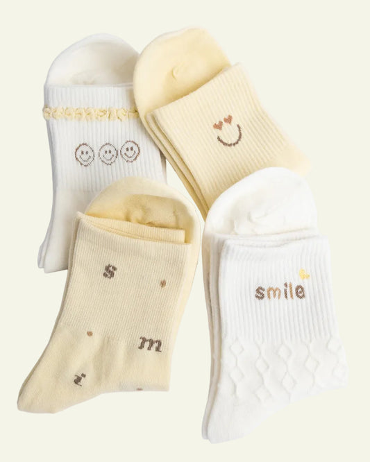 Women’s cotton quarter socks set with smiley designs in cream and butter yellow