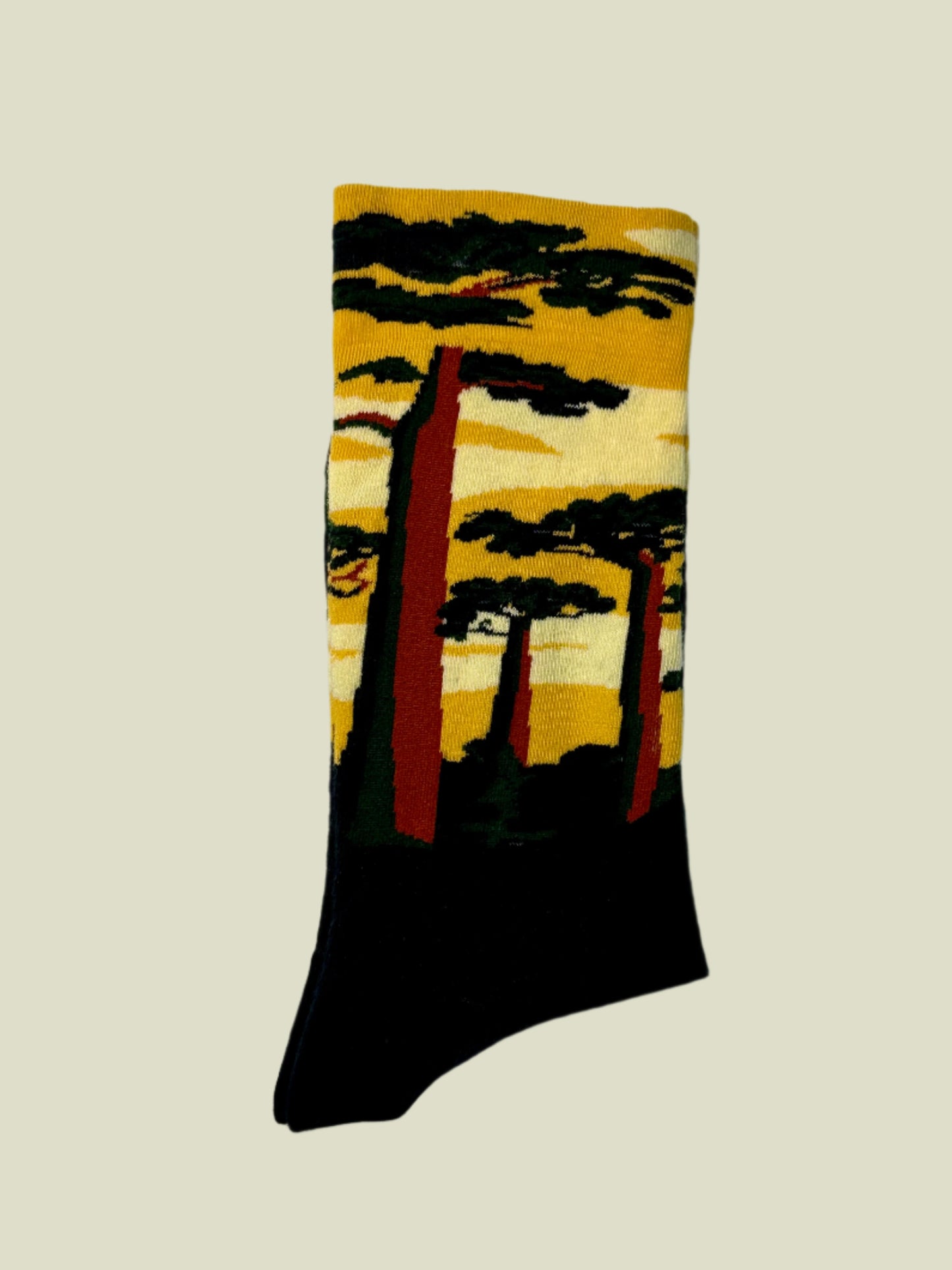 Cute and unique crew socks with sunset colors and nature-inspired elements, made from soft, stretchy cotton blend.
