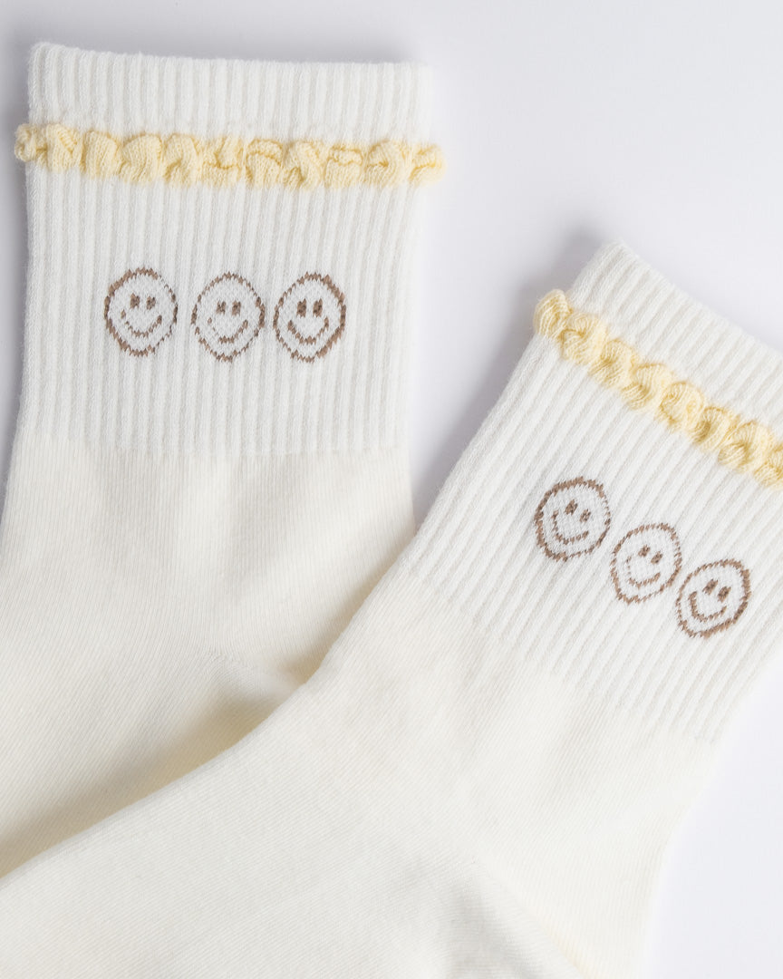 White cotton quarter socks for women with minimalist smiley embroidery
