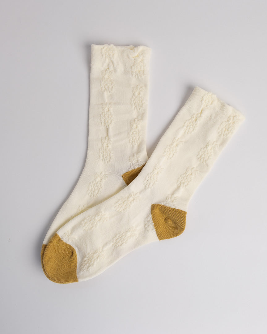 Close-up of textured knit cotton socks soft breathable fabric detail