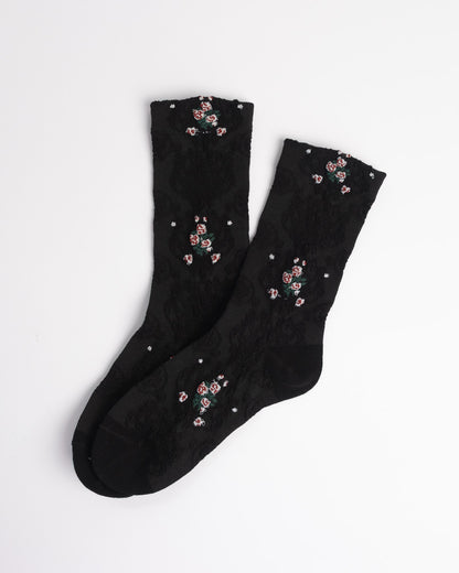 Black socks with floral patterns 