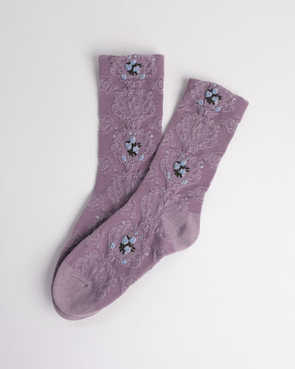 Women’s cotton crew socks with textured floral knit pattern in purple