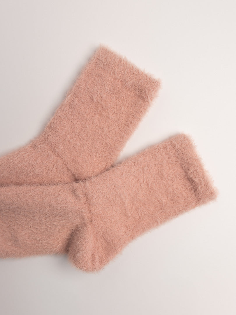 women cozy fuzzy crew socks light pink folded soft texture winter socks