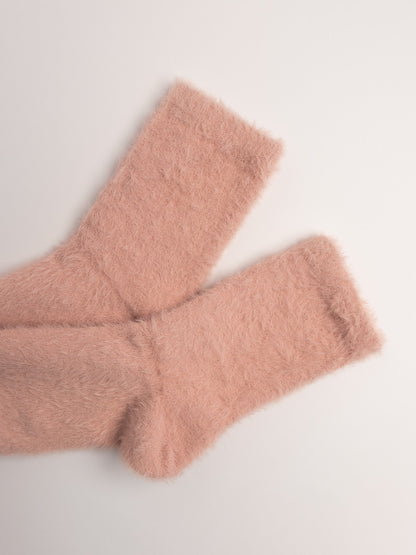 women cozy fuzzy crew socks light pink folded soft texture winter socks