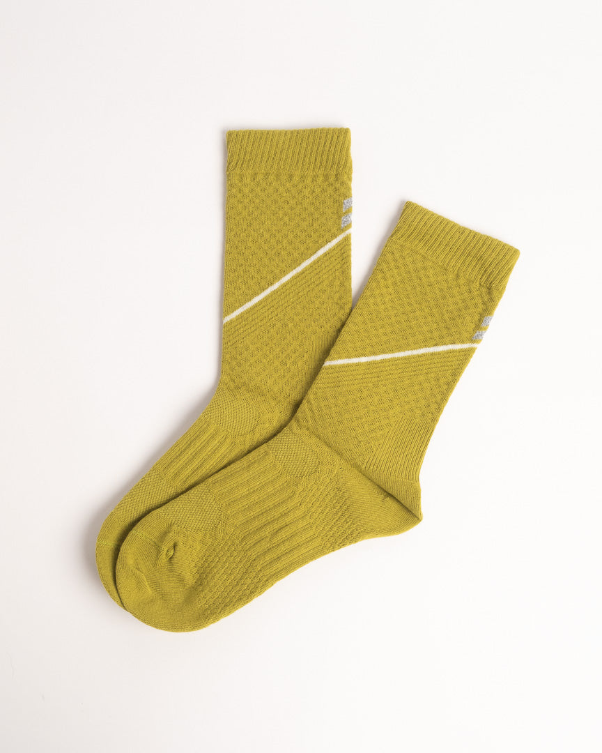 Women's yellow performance crew socks for hiking and cycling with cushioned comfort