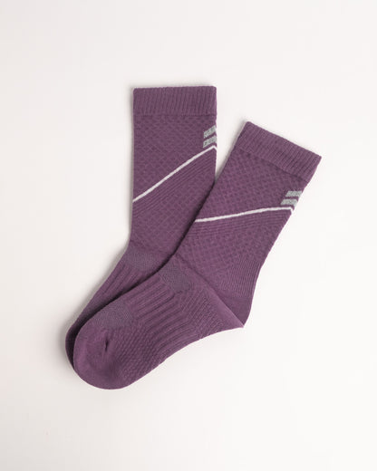Women's purple performance crew socks for hiking and cycling with breathable knit and cushioned comfort