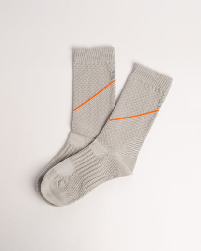 Women's beige performance crew socks with breathable cycling support and soft stretch fit