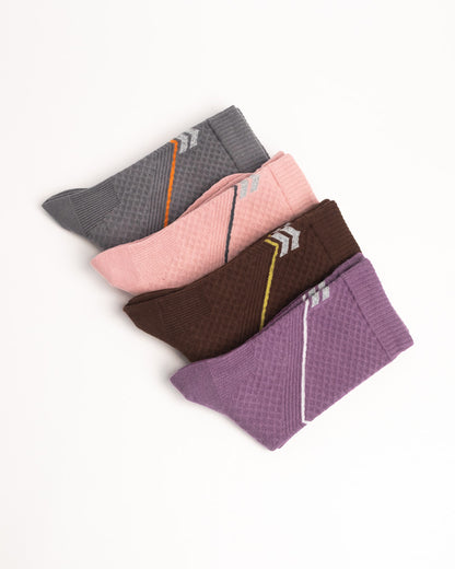 Women's performance crew socks in purple and pink with breathable knit and cushioned comfort