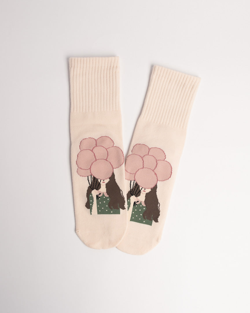 Women's cotton crew socks featuring girl and pink balloon illustration with breathable everyday comfort
