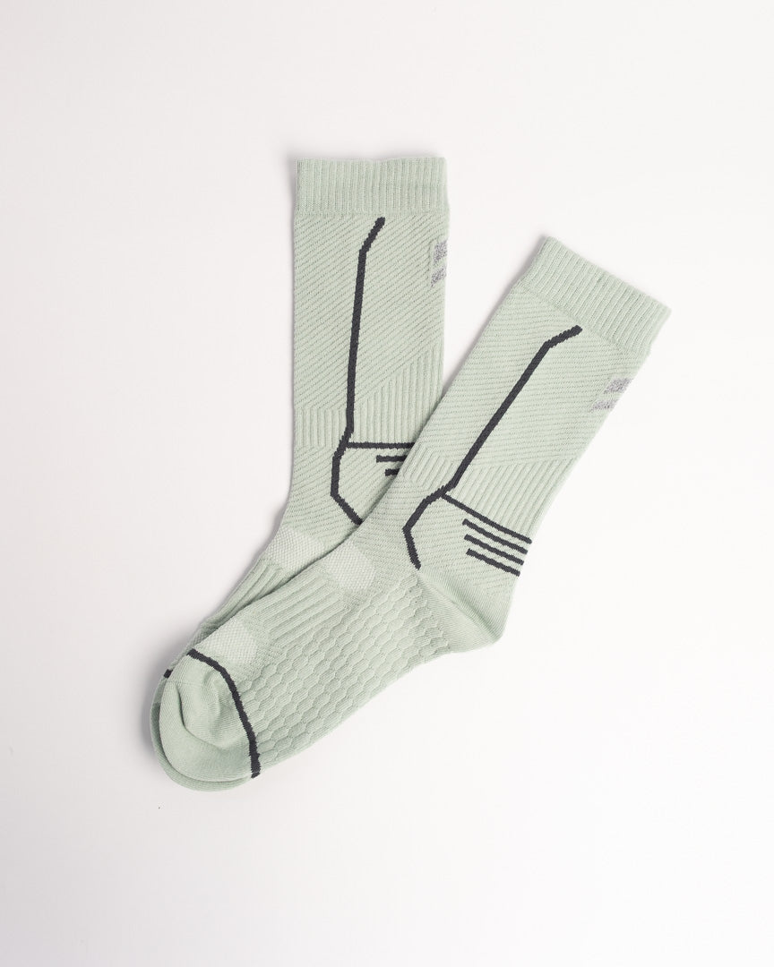 Men's sage green performance crew socks with breathable athletic support and seamless toe comfort