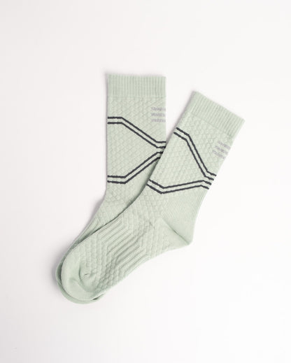 Men's green athletic crew socks with breathable cotton blend and everyday comfort