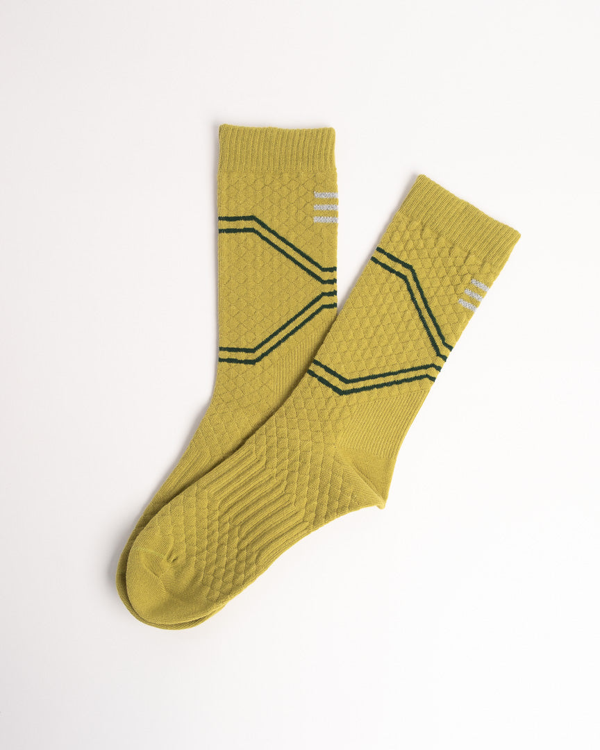 Men's yellow athletic crew socks with breathable sports design and arch support
