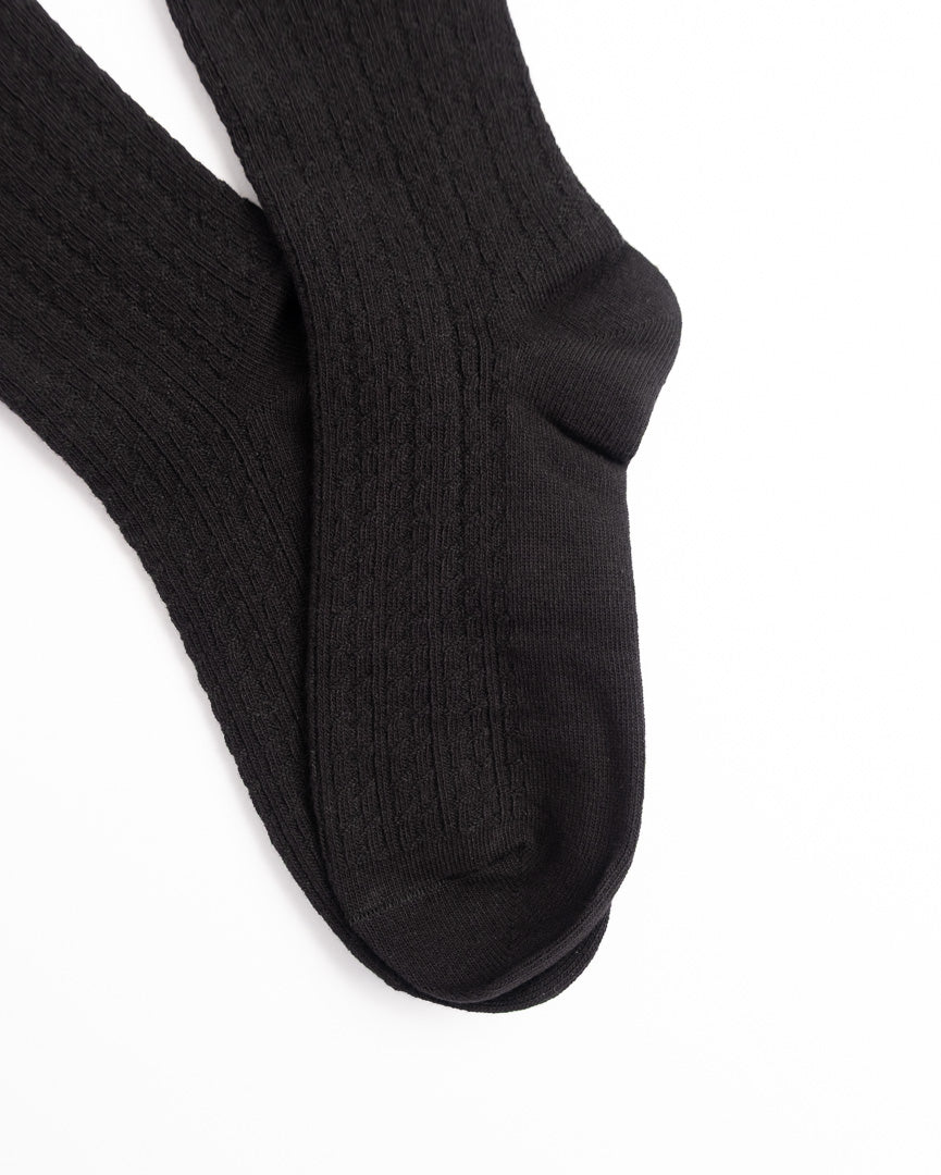 Women's black cotton crew socks featuring ribbed knit and soft everyday comfort