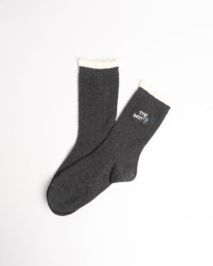 Women's ribbed cotton crew socks with contrast ruffle cuff and bow embroidery in black, cream and grey