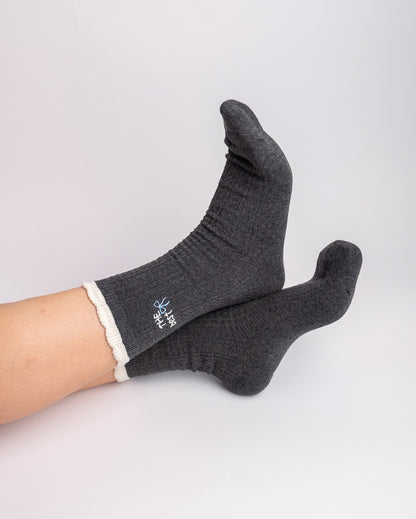 Cream women's ribbed cotton crew socks with contrast cuff and bow embroidery