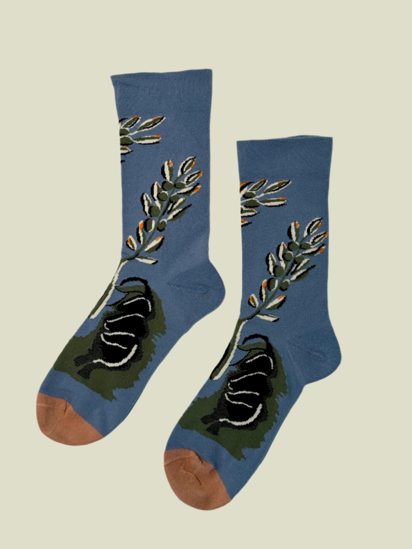 Aesthetic cotton crew socks with nature-inspired leaf design and blue color tones for women.