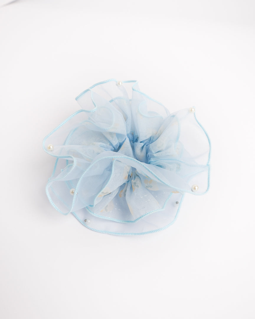 Double-Layer Organza Cherry Scrunchie in light blue featuring yellow cherry print and stud-clipped pearl edge details on flat lay white background