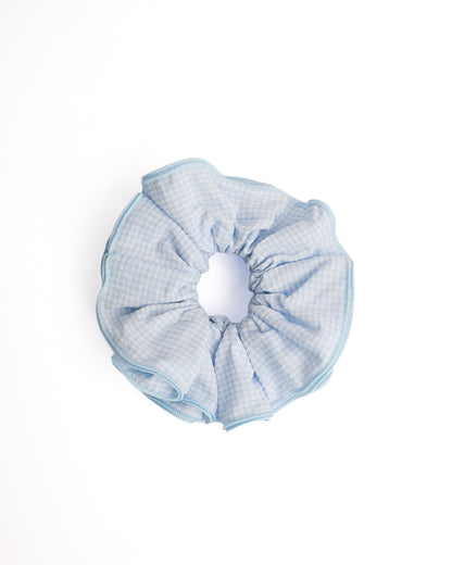 Gingham Blue Trim Hair Scrunchie in light blue with matching blue piping on flat lay white background