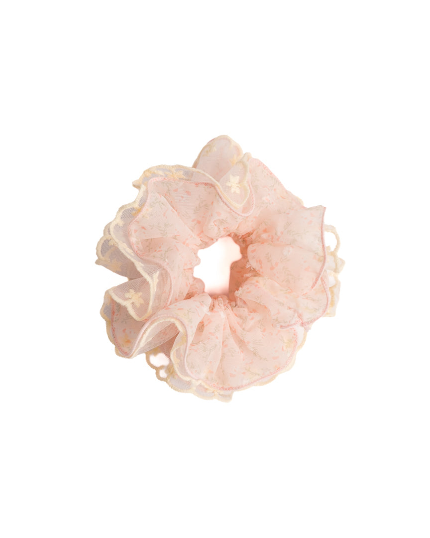 Scalloped Floral Sheer Hair Scrunchie in pink featuring floral print and yellow embroidered lace trim on flat lay white background