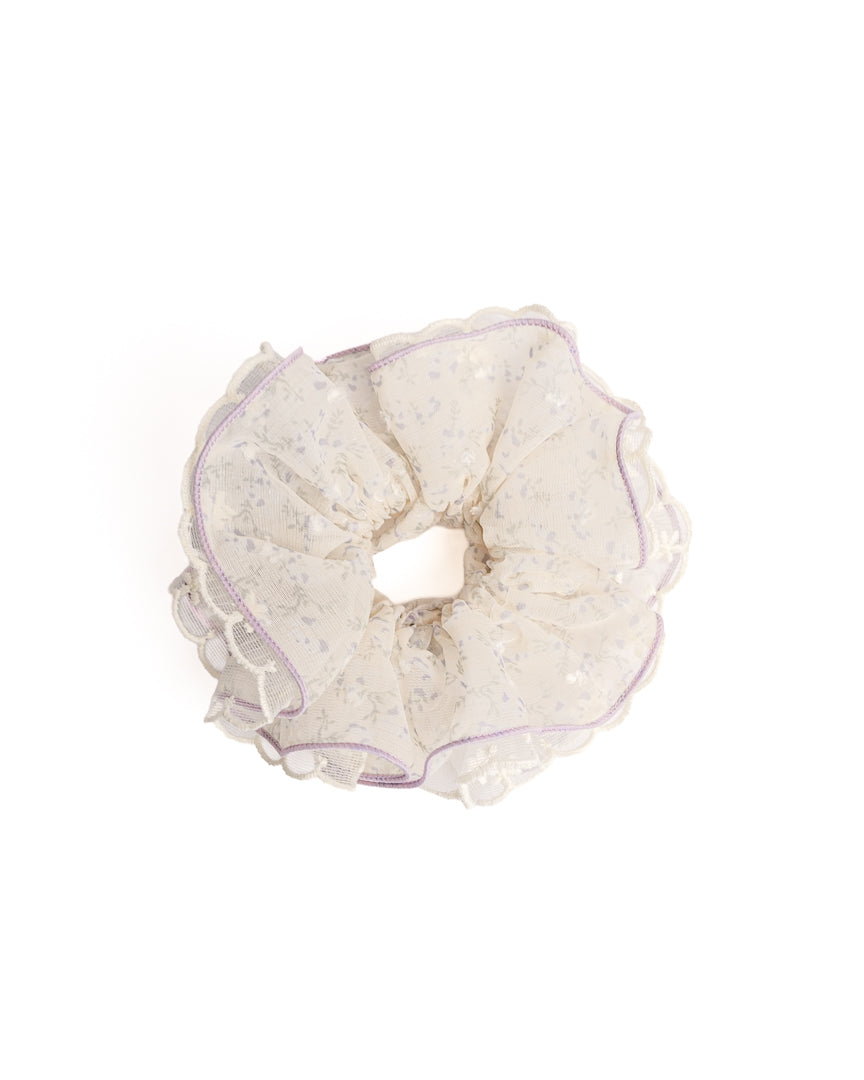 Scalloped Lavender Floral Sheer Hair Scrunchie in cream featuring lavender floral print and embroidered lace trim on flat lay white background