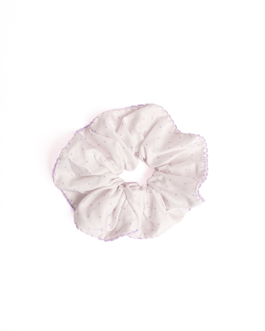 Polka Dot Silky Hair Scrunchie in purple with purple dots and scalloped crochet edge on flat lay white background