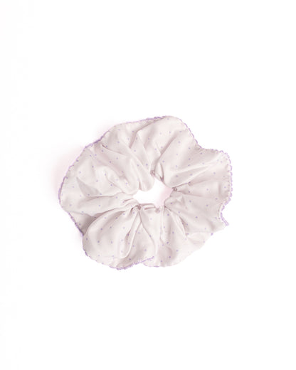 Polka Dot Silky Hair Scrunchie in purple with purple dots and scalloped crochet edge on flat lay white background