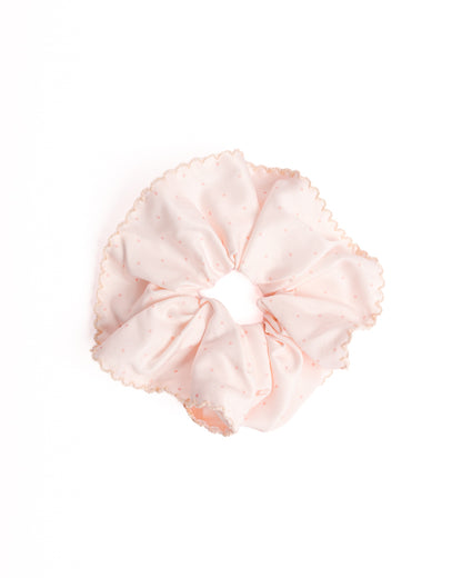 Polka Dot Silky Hair Scrunchie in pink with pink dots and scalloped crochet edge on flat lay white background