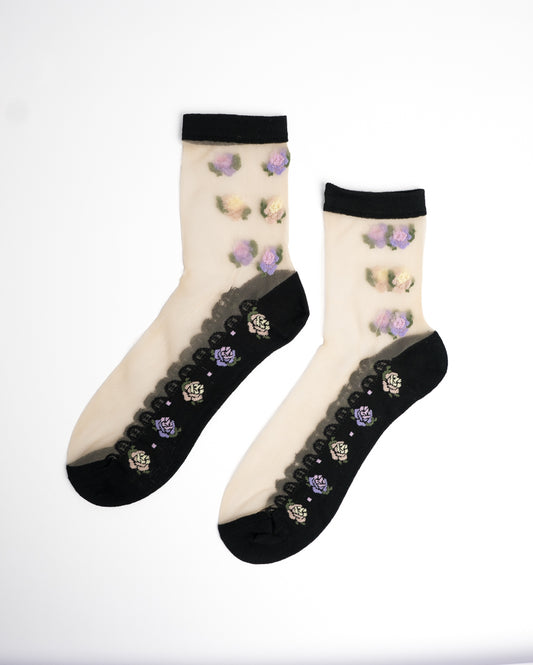 Rose Floral Sheer Crew Socks in black with purple rose embroidery and lace trim on flat lay white background