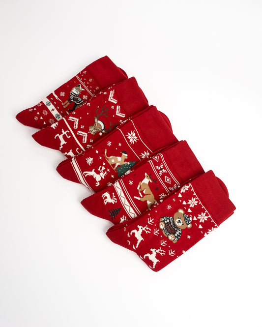 Five red Christmas socks with white and gold holiday patterns, including Santa Claus, reindeer, snowflakes, and ornaments, arranged diagonally on a white background.