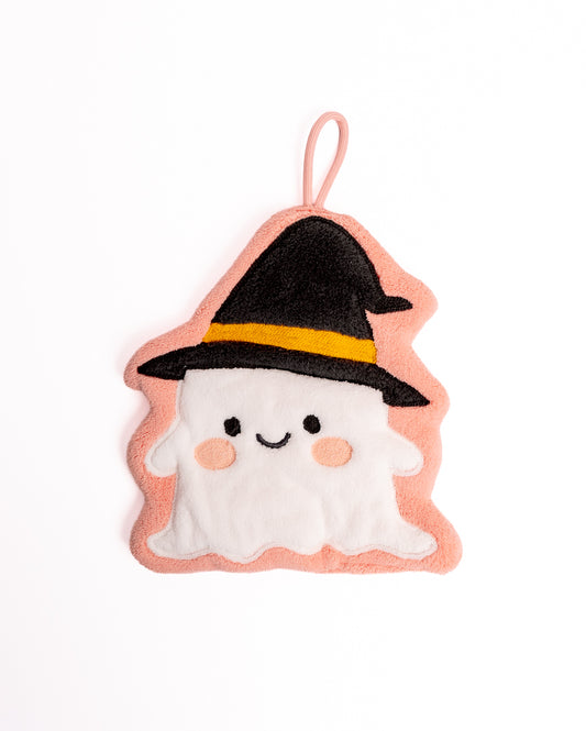 Spooky Cute Witch Ghost Kitchen Hanging Hand Towel in pink featuring smiling ghost with black witch hat and hanging loop on flat lay white background