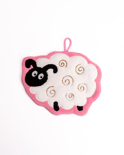 Cute Cartoon Sheep Kitchen Bathroom Hanging Hand Towel in deep pink featuring fluffy white fleece, brown swirl embroidery, black sheep face, and hanging loop on flat lay white background