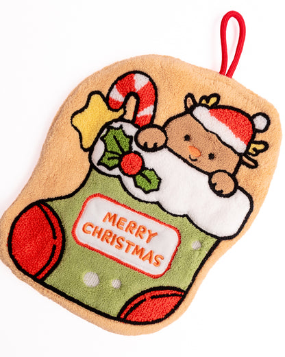 Detailed view of cute reindeer wearing Santa hat on Christmas stocking hanging hand towel