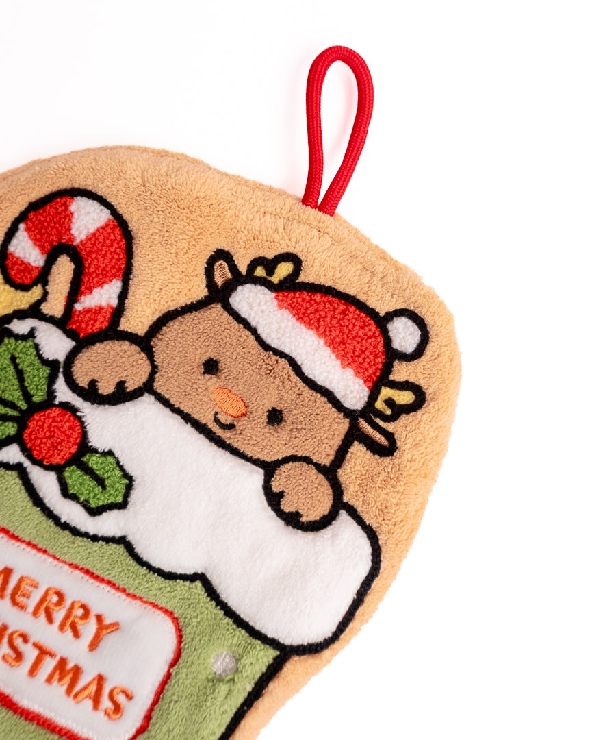 Close-up of Christmas reindeer stocking hanging hand towel showing detailed embroidery and festive graphics