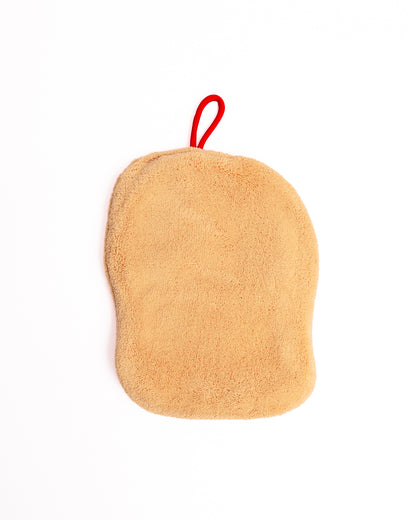 Back view of Christmas stocking hanging hand towel showing soft coral fleece fabric and red hanging loop