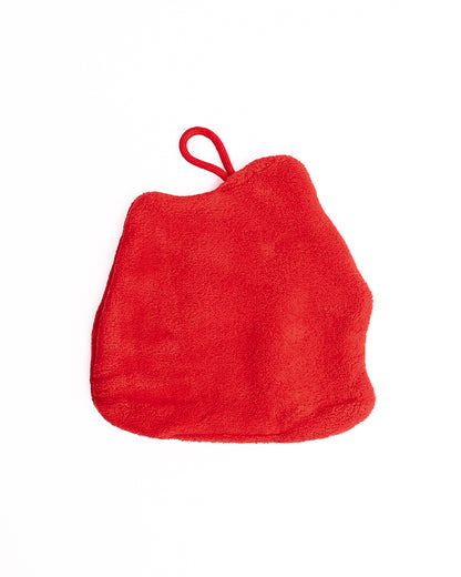 Back view of red Christmas gingerbread house hanging hand towel showing soft coral fleece fabric and red hanging loop