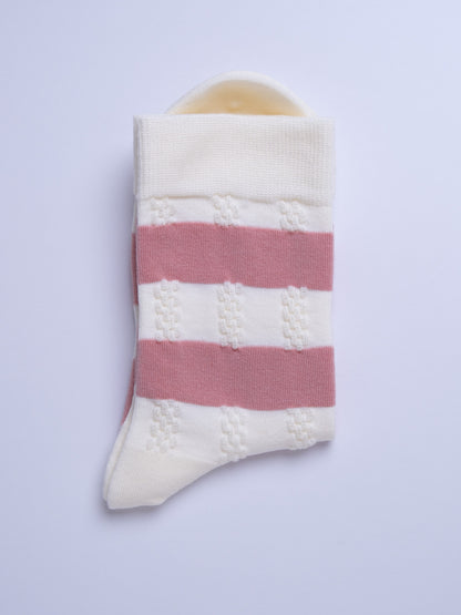 Striped sock with pink and white pattern on a light gray background