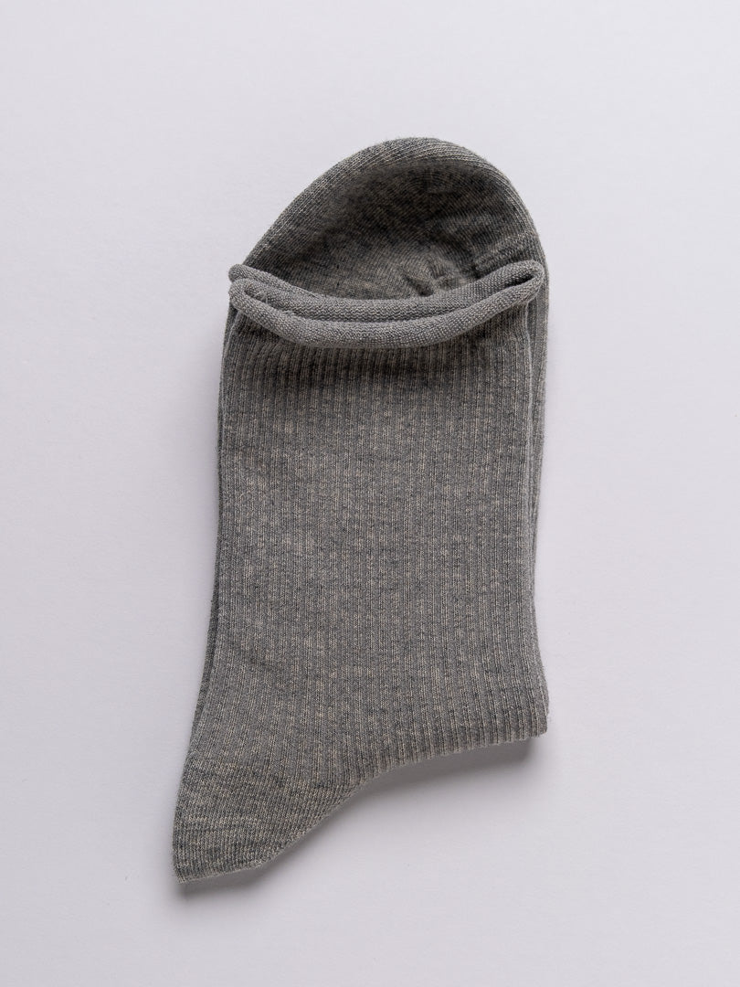 Gray sock on a light gray background