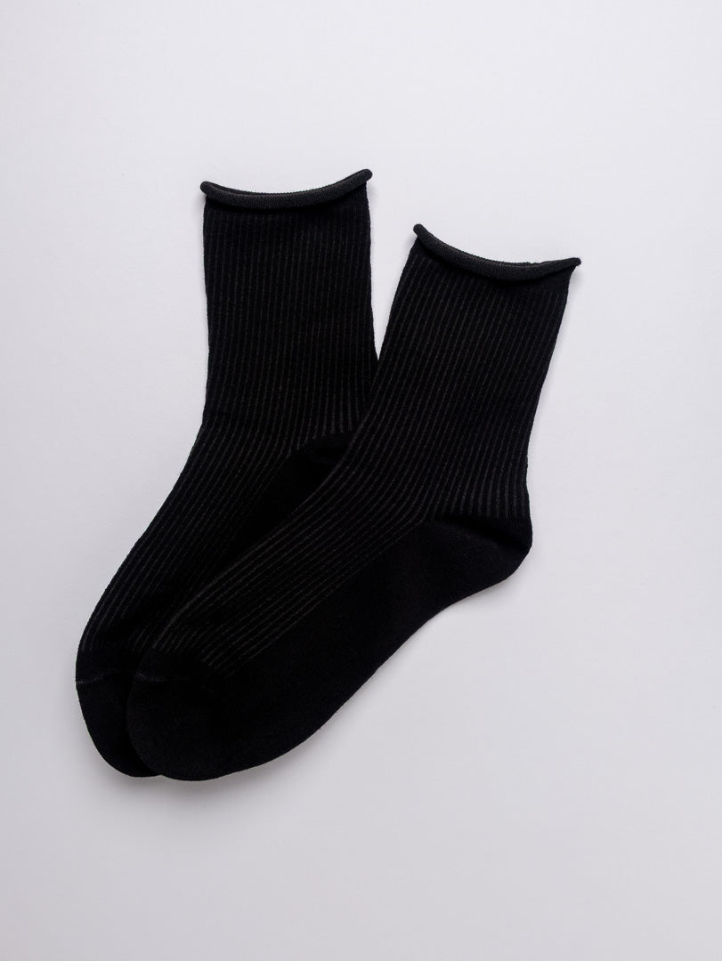 Black socks on a light gray background