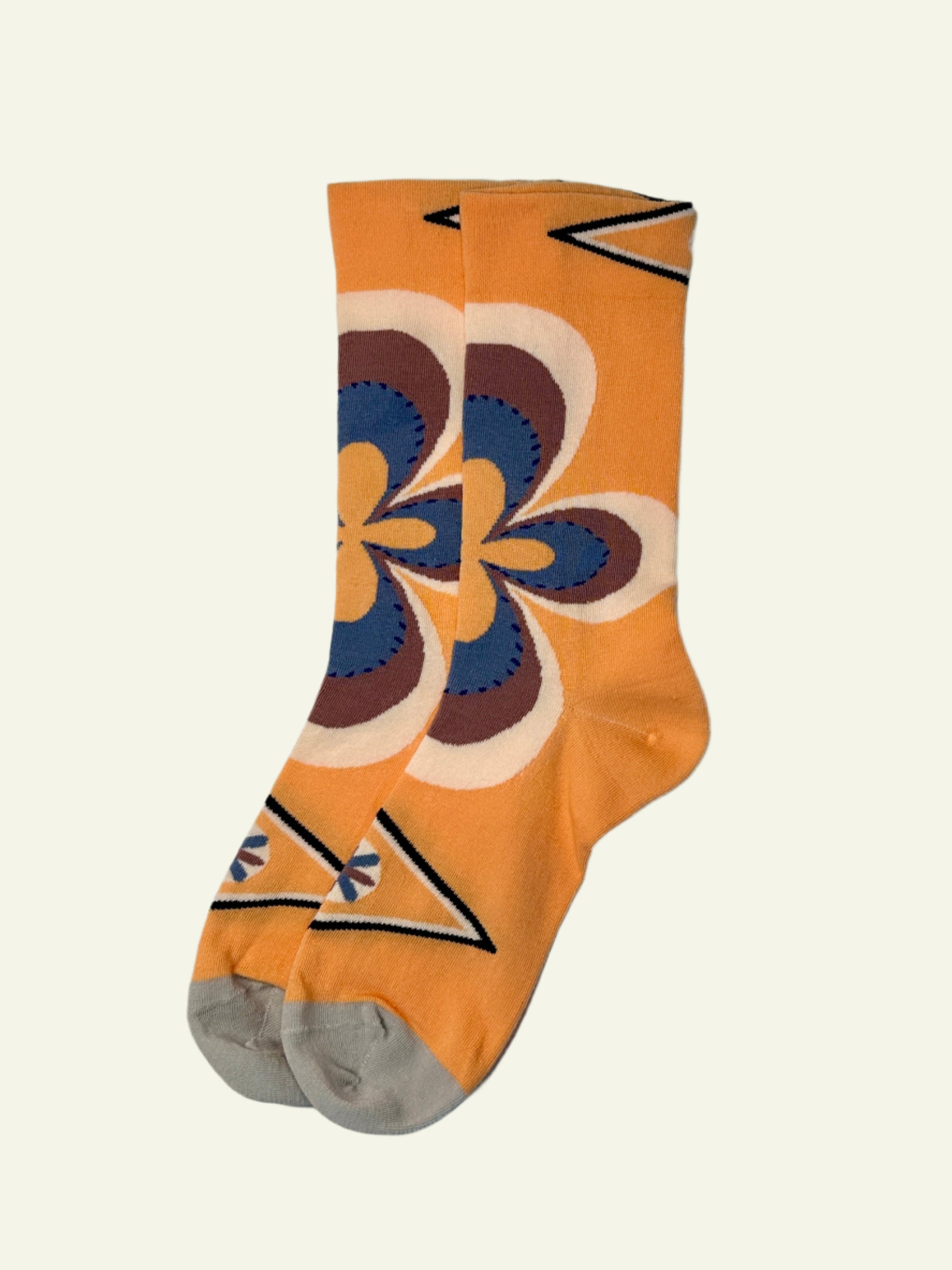 Colorful women’s aesthetic socks with bold flower patterns, retro vibes, and comfy fit for everyday outfits.