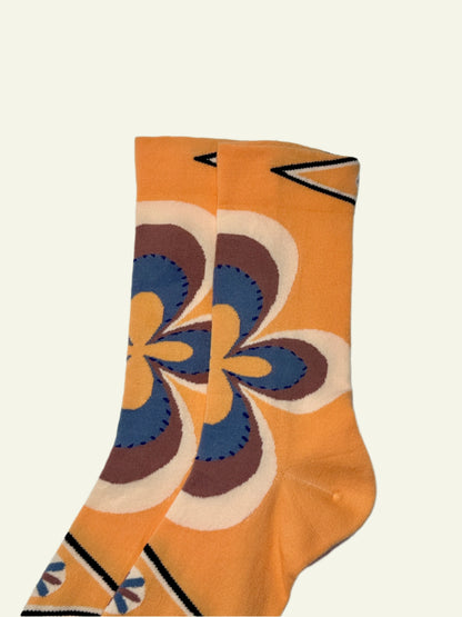 Women’s orange retro socks with blue flower design, breathable and cute socks for Y2K and aesthetic fits.
