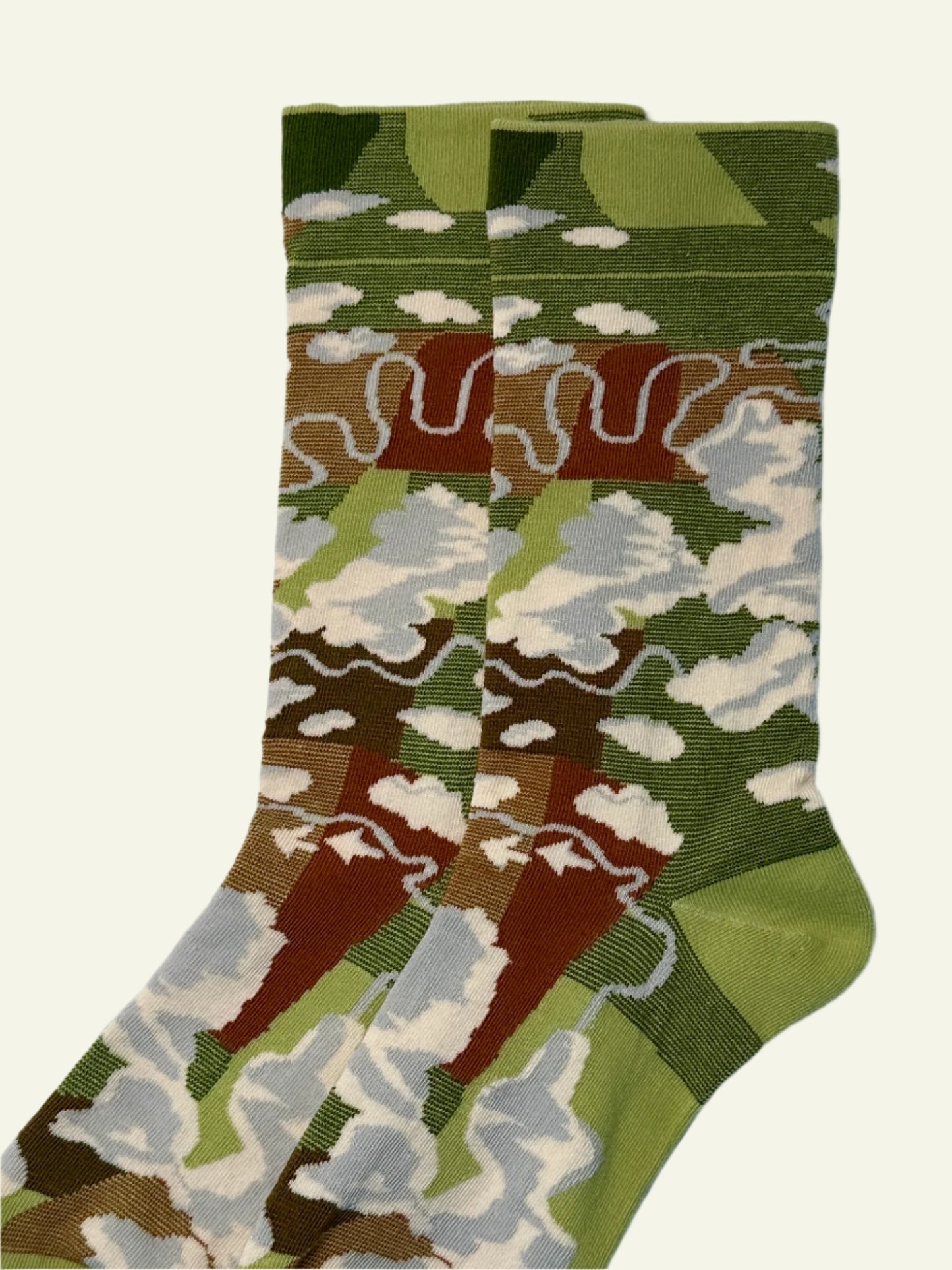 Aesthetic cotton crew socks for women featuring green forest tones, cute cloud patterns, and a cozy jacquard knit design.