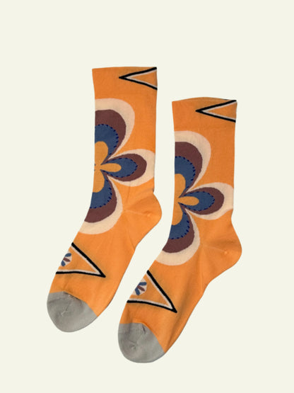 Retro flower socks in vibrant orange and blue, perfect for aesthetic outfits.
