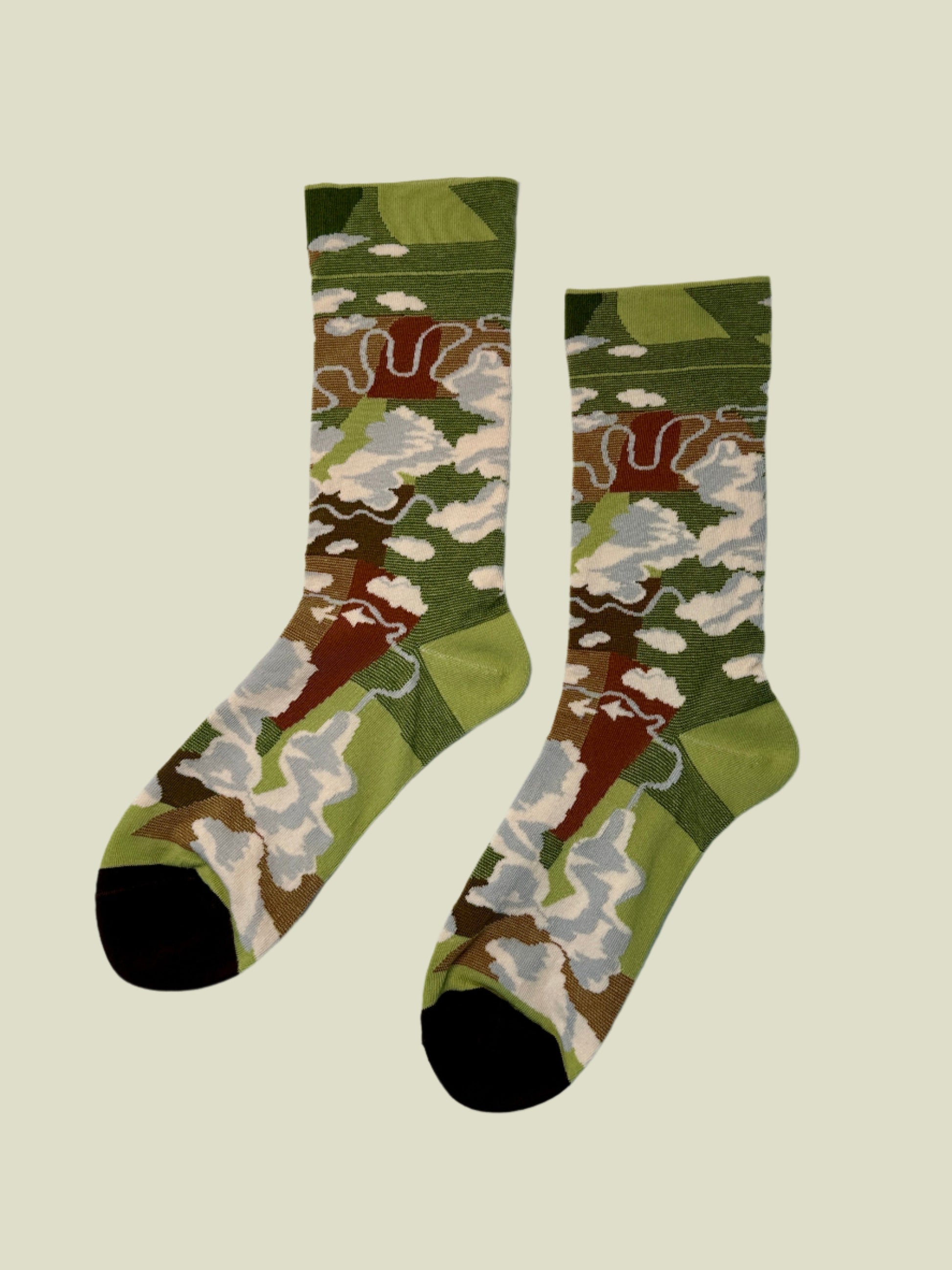 Aesthetic cotton crew socks for women featuring green forest tones, cute cloud patterns, and a cozy jacquard knit design.